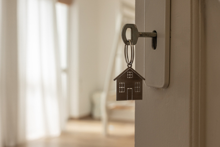 house keys hanging from a door lock