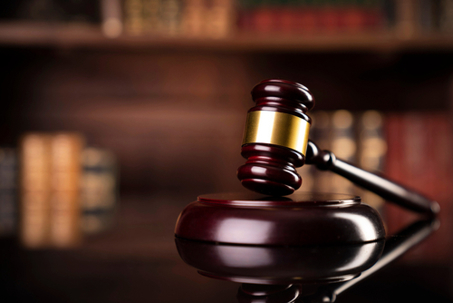 Law and justice. Wooden judge gavel, close-up view.